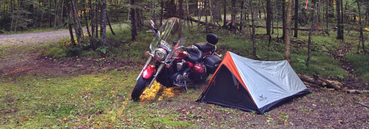 A motorcycle and a tent
